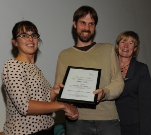 Oisín picking up the certificate of merit